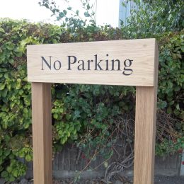 Woodsman vehicle warning sign